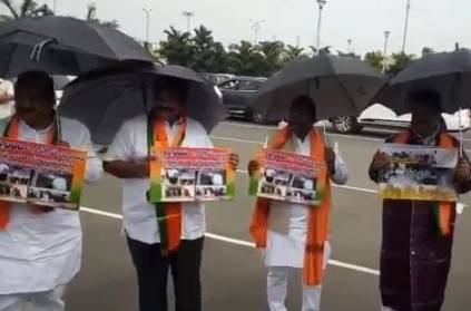 BJP MLAs wear raincoats to protest water leaks at Assembly in AP