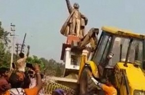 BJP men bulldoze Lenin statue in Tripura