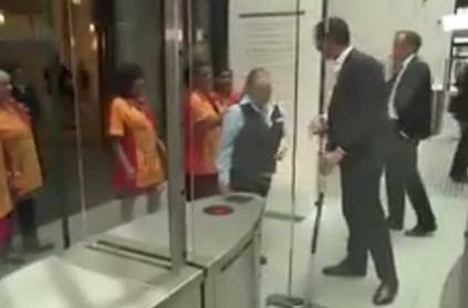 Watch: Dutch PM mops floor after spilling coffee.
