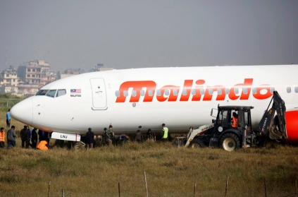 Plane with 139 on board skids off runway in Nepal.